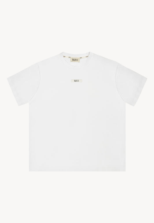 Front of cream T-shirt with Bizuu logo on front TISHALLE.