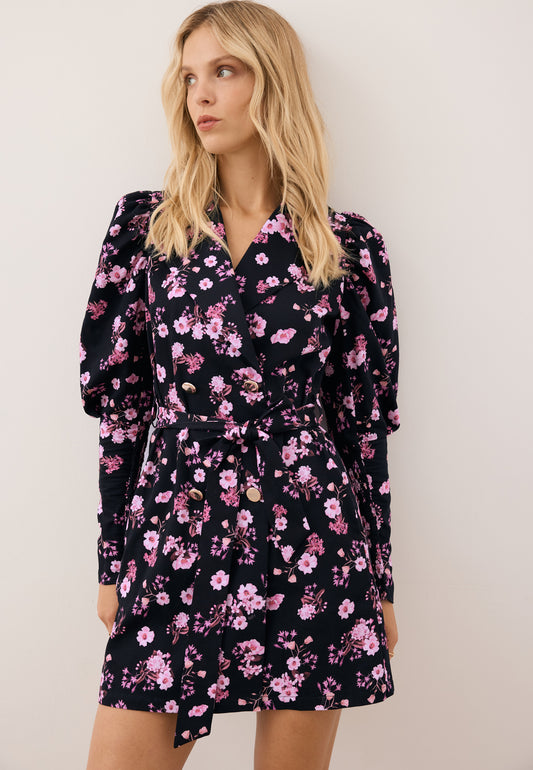 Model wearing the floral GEORGINA dress, looking to the side.