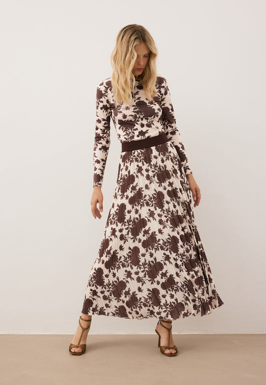 Pleated beige MAXI MINA skirt with floral print.