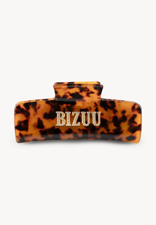 Tortoiseshell RHODI rectangular hair clip.
