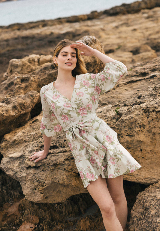 Front of envelope dress with floral print on green background AMBROSIA.