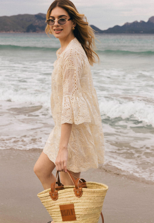 The front of the cream mini dress in English SANTIA embroidery.