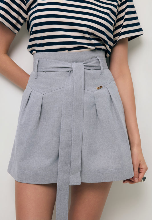 Close-up of the KANDYS grey high-waisted shorts.