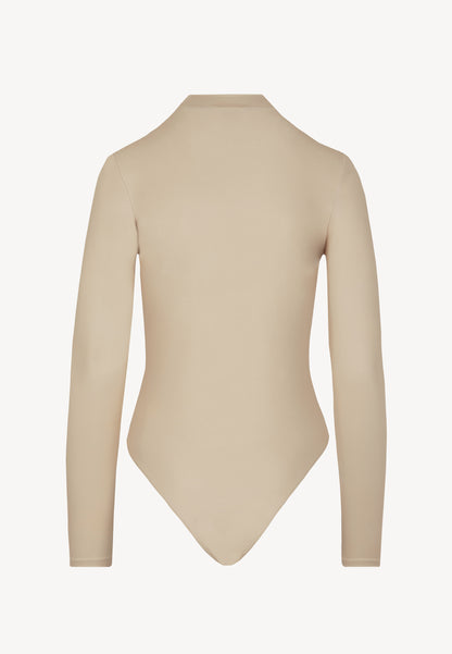  LOMMA beige bodysuit with a deep V-shaped neckline