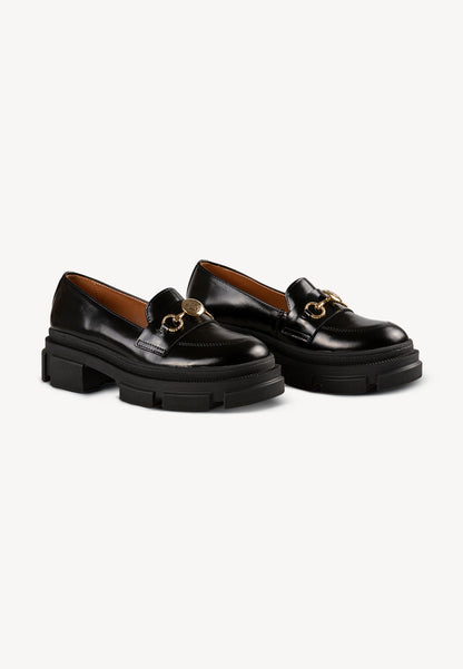 LESOTHO black leather moccasins