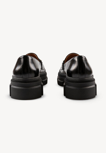 LESOTHO black leather moccasins