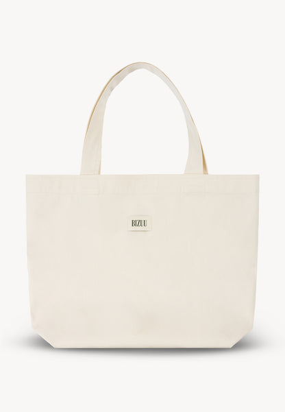 Cotton bag with a jacquard logo label, BAGGIE in cream