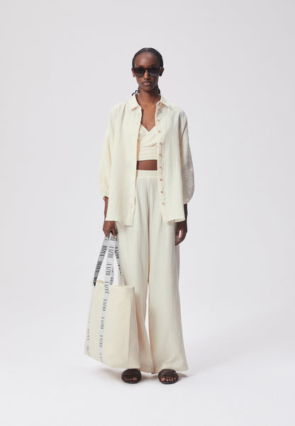 An oversized muslin shirt with a dropped shoulder line FOGO cream