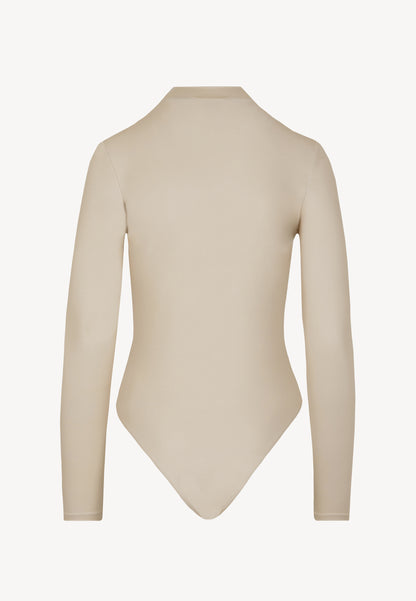  LOMMA beige bodysuit with a deep V-shaped neckline