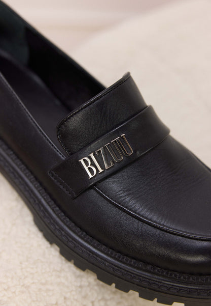 Black women's leather moccasins with silver logo OSBY