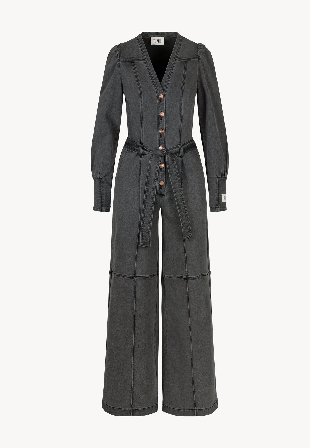 Dark gray denim jumpsuit with long sleeves, wide legs, and buttons down the front. Tied at the waist with a belt.