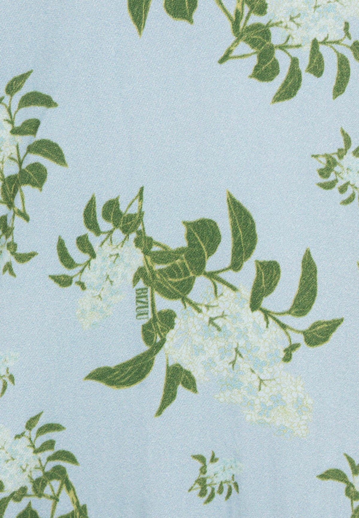 A close-up of the print detail of the TILDA dress.