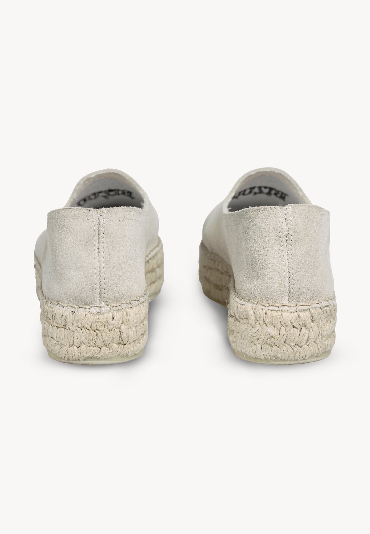The back of AYLA's cream espadrilles.