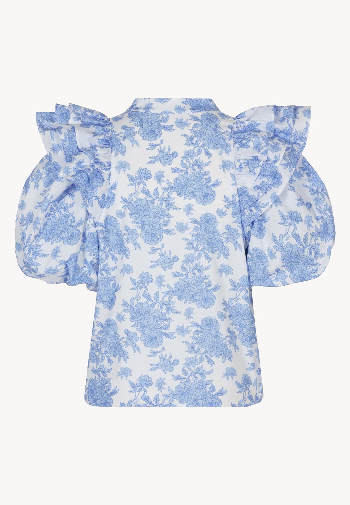 The back of the blouse with buff sleeves ALIANNA in blue print.