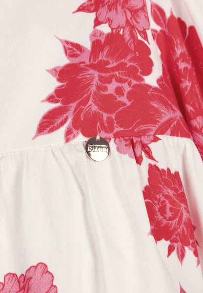 Cream AYOTE mini dress with a flared hem