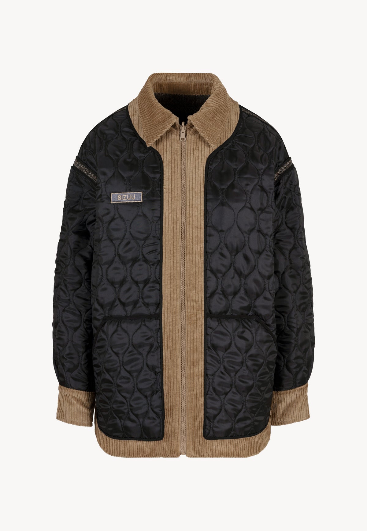The front of the reversible, quilted BAIONA jacket is shown on the black side.