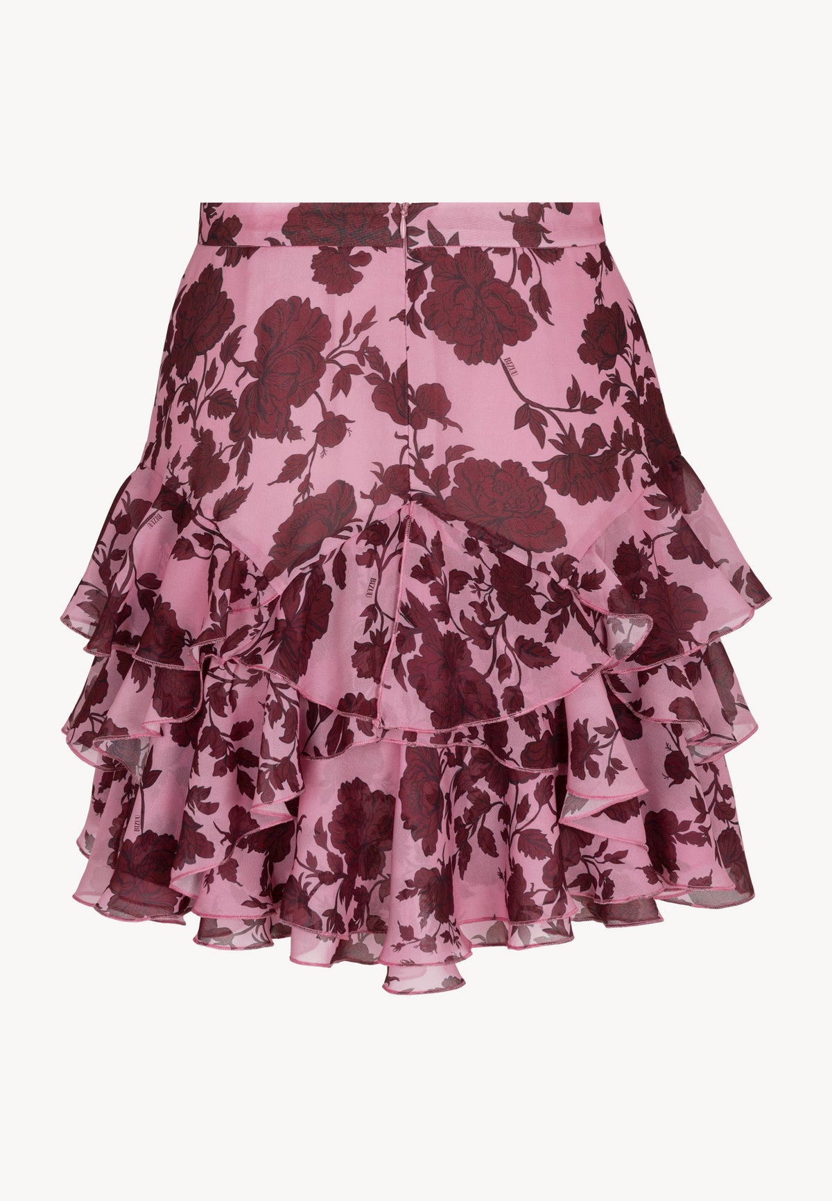 The back of the pink CANDICE skirt with a zipper at the back.