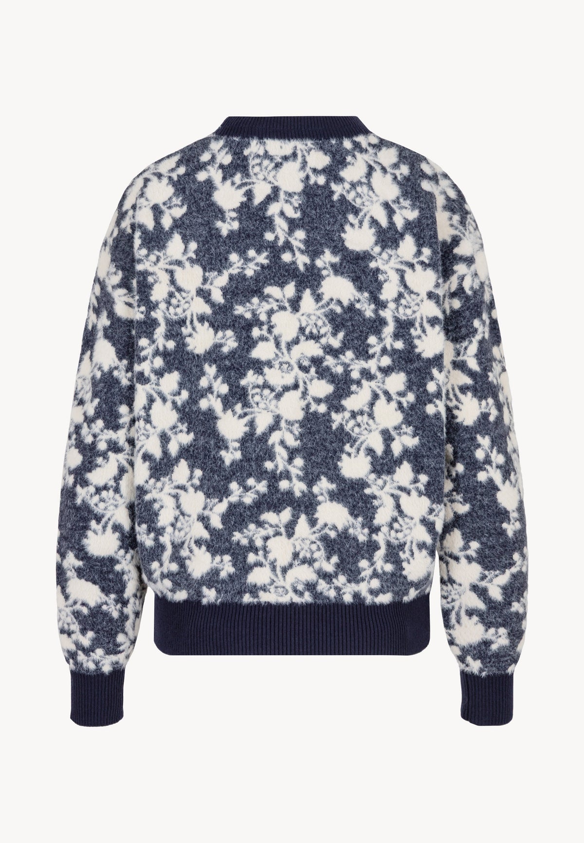Back view of the floral CANELA sweater.