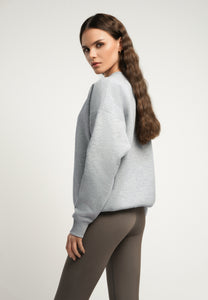 Grey COLLY sweatshirt with a logo label.