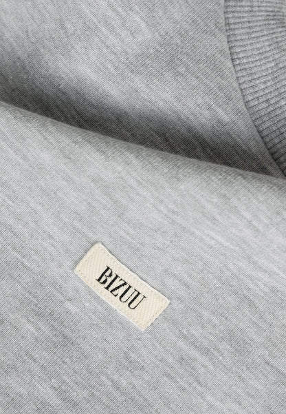 Grey COLLY sweatshirt with a logo label.