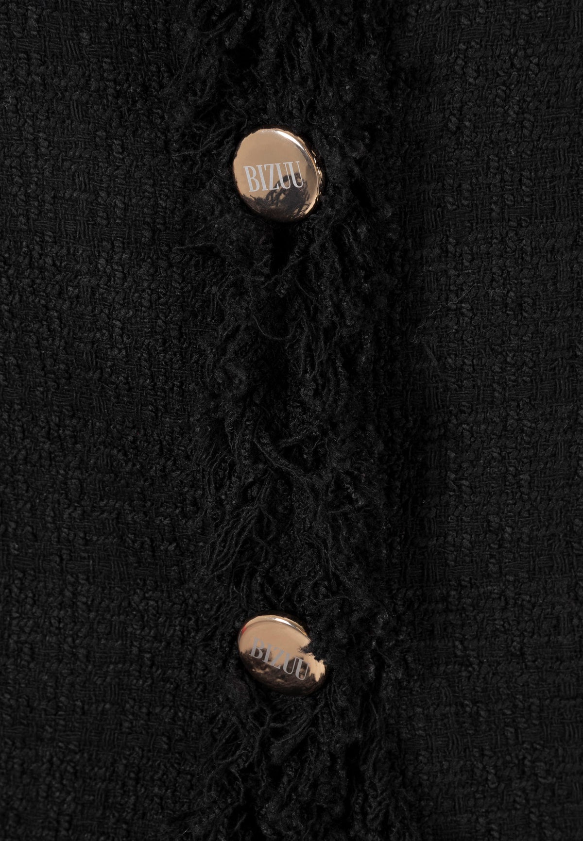 Close-up of the branded gold buttons on the DITAS blazer.