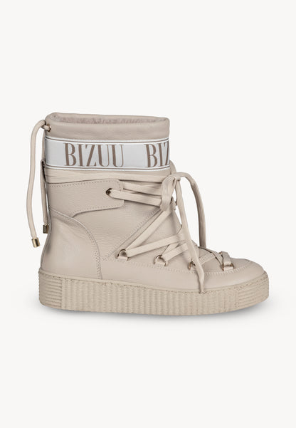 Leather snow boots with branded tape ESPEN in beige.