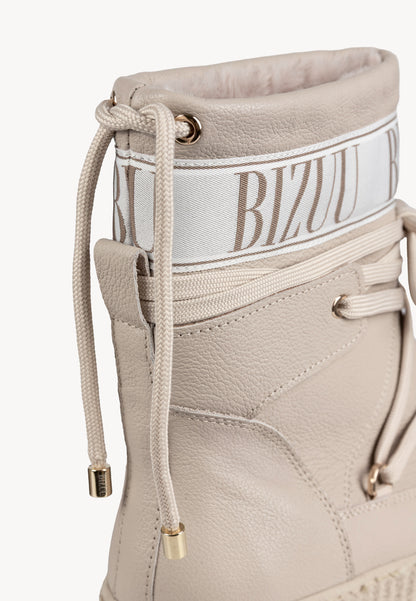 Leather snow boots with branded tape ESPEN in beige.