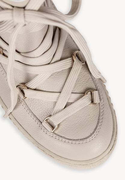 Leather snow boots with branded tape ESPEN in beige.