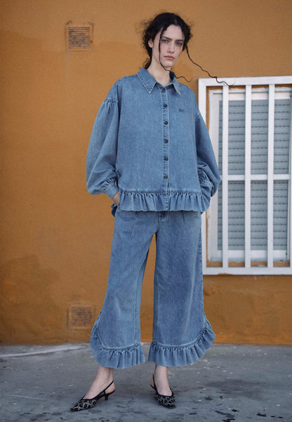 NELLA denim trousers with wide legs and a ruffle detail.