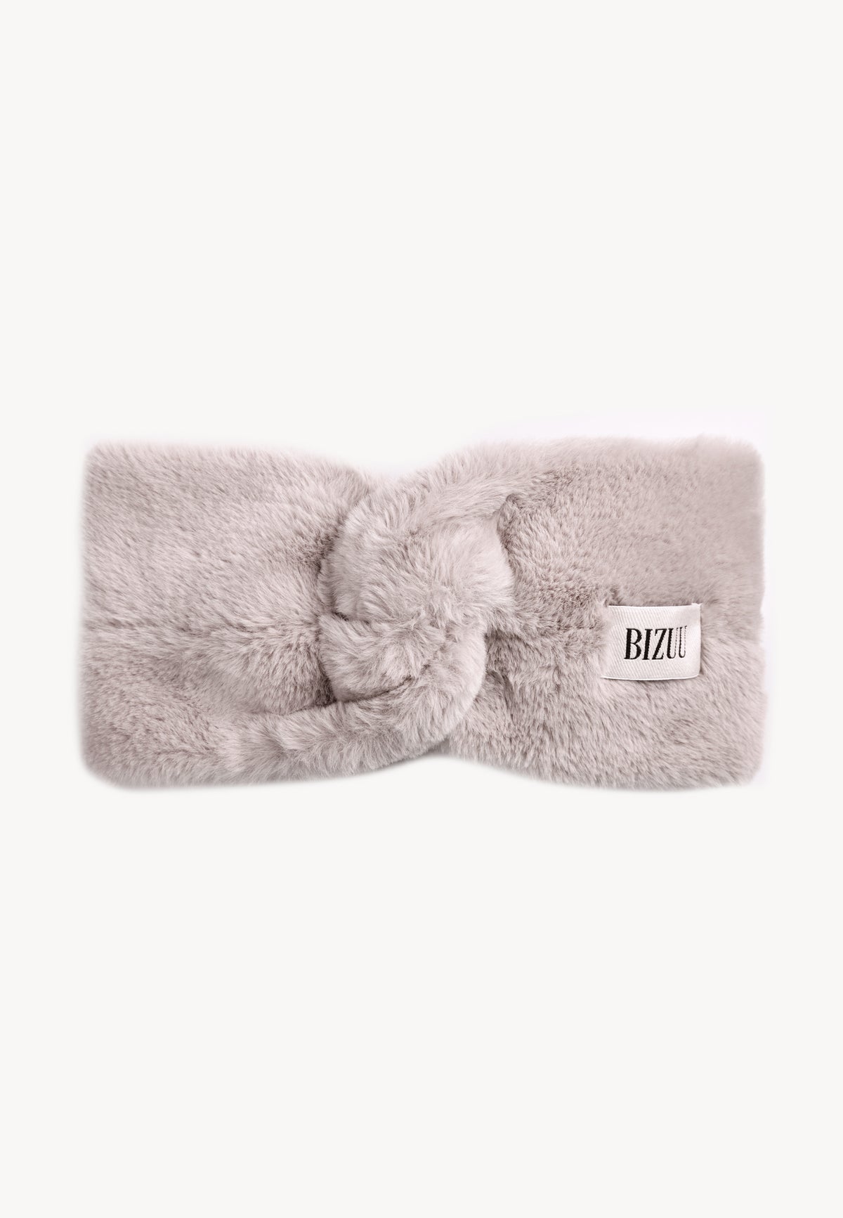 Beige faux fur FEMI headband with a decorative twist and jacquard label.