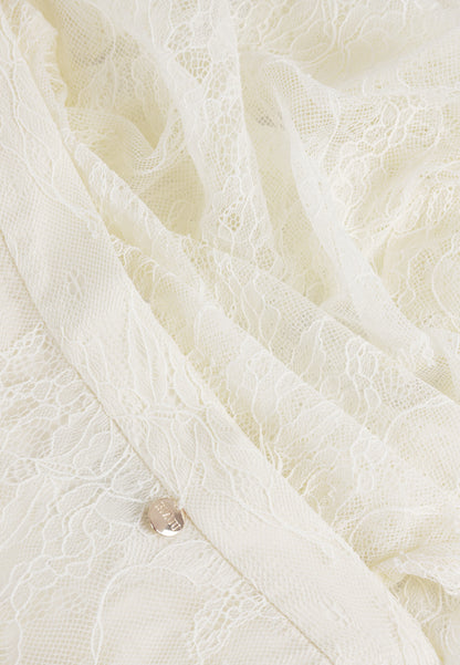 A cream FLACE lace skirt.