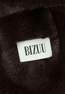 Brown FLUFFY scarf with a branded label.