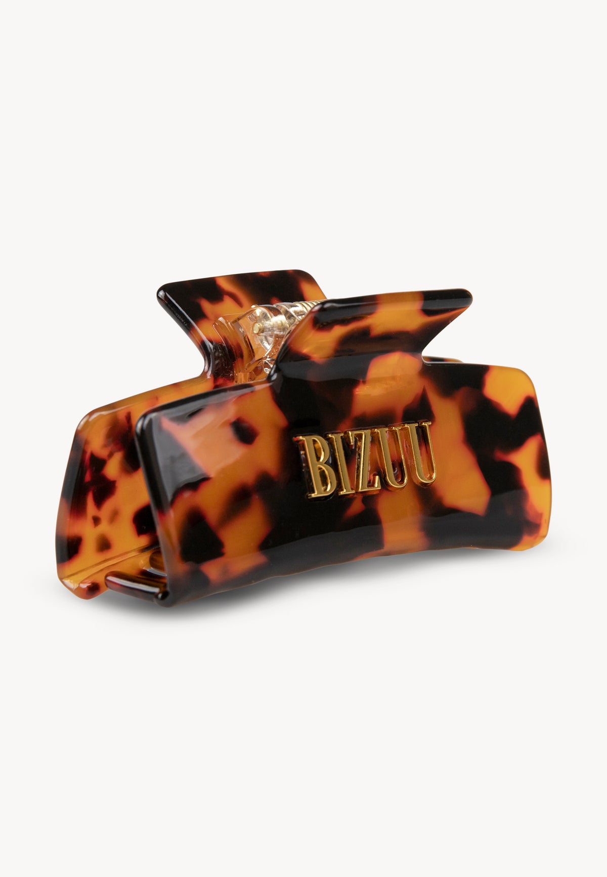 Rectangular GLIMMA hair clip in brown.