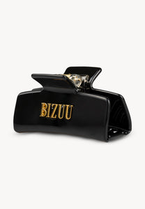 Black GLIMMA hair clip with logo