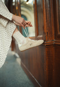 Beige women’s suede LEOLA sneakers.