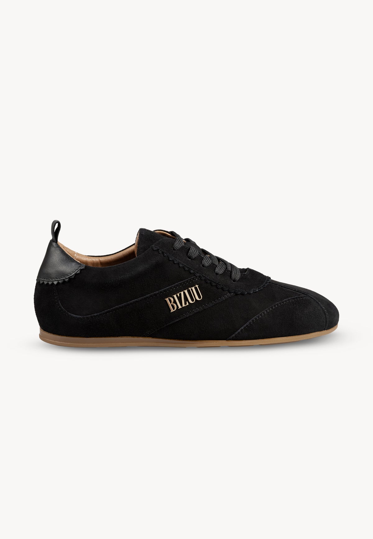 Black LEOLA sneakers standing sideways, with a gold Bizuu logo on the upper side.
