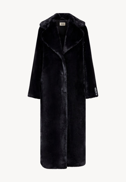 Black fur coat with leopard print on the back LIVORNO