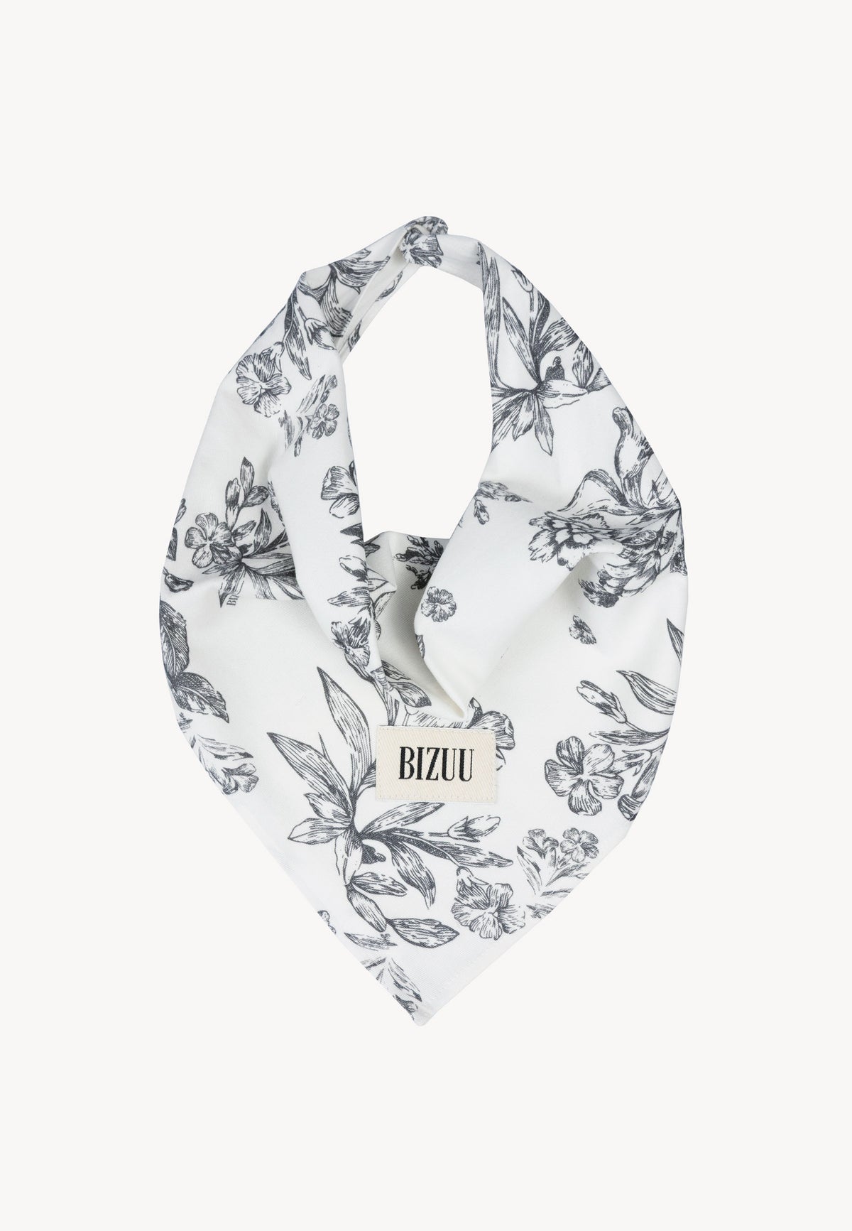 Dog scarf folded into a triangle and arranged as it will be tied around the neck.
