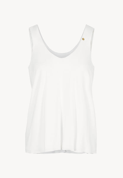 Cream LULY top with a relaxed fit