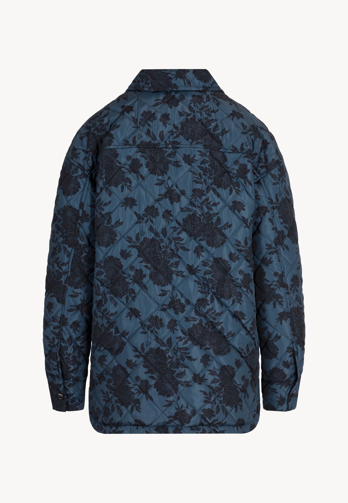 The back of the MARIN quilted jacket with a floral print.