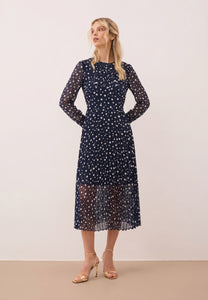 Navy polka dot dress with a pleated hem – NYLA