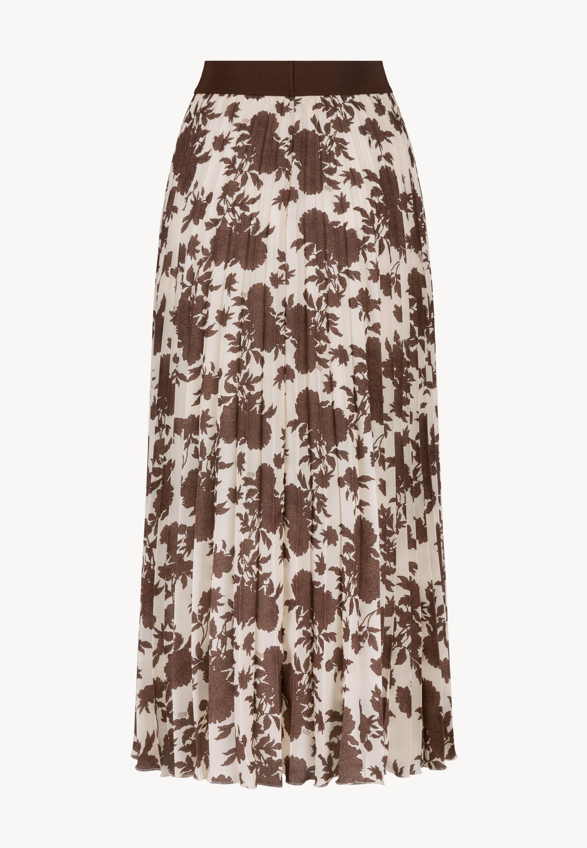 Back view of the pleated MINA skirt with elastic waistband in floral print.