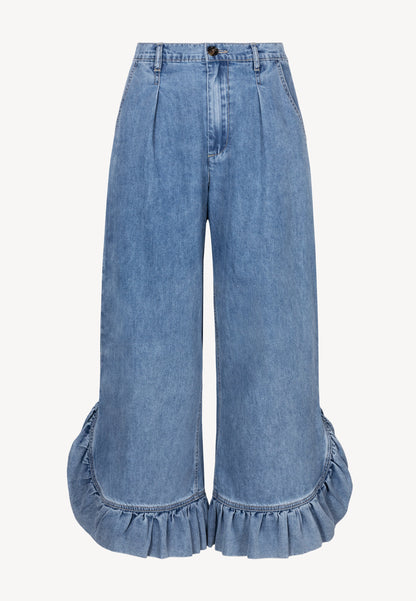 NELLA denim trousers with wide legs and a ruffle detail.