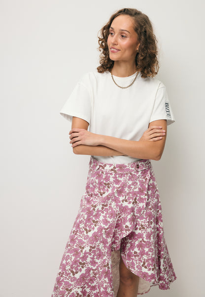Asymmetrical NIIAM denim skirt in a pink floral print