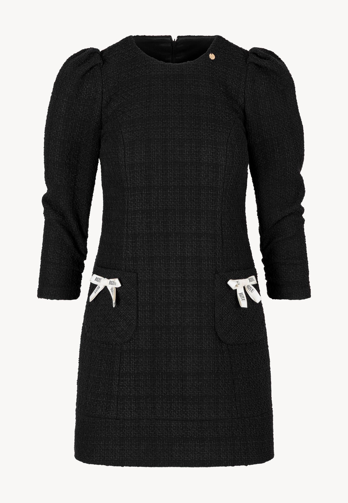 Front view of the classic black NOILLY mini dress with bow details at the front.