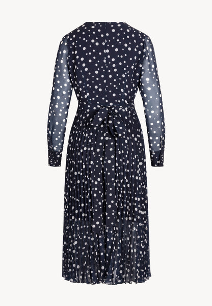 Navy polka dot dress with a pleated hem – NYLA