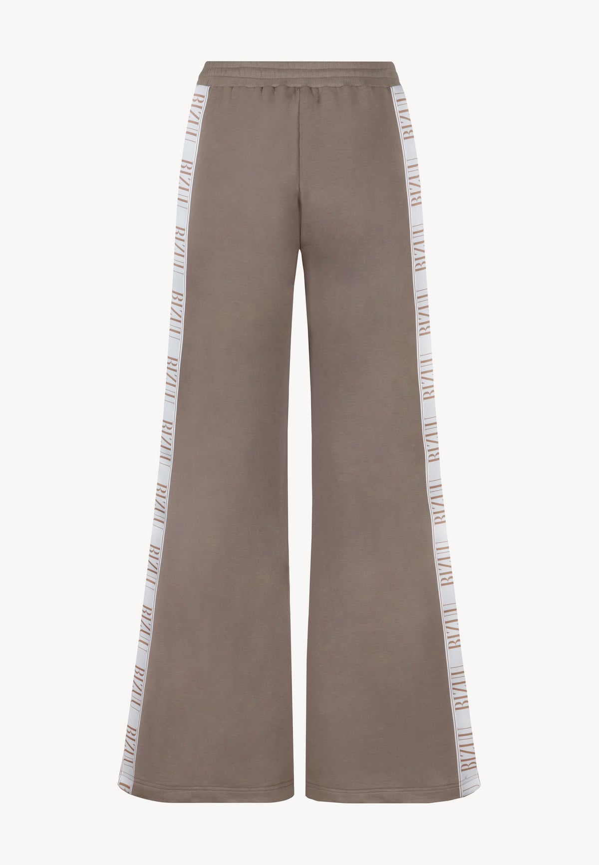 The reverse of PETRA's loose-fitting sweatpants with logo stripe on the legs.