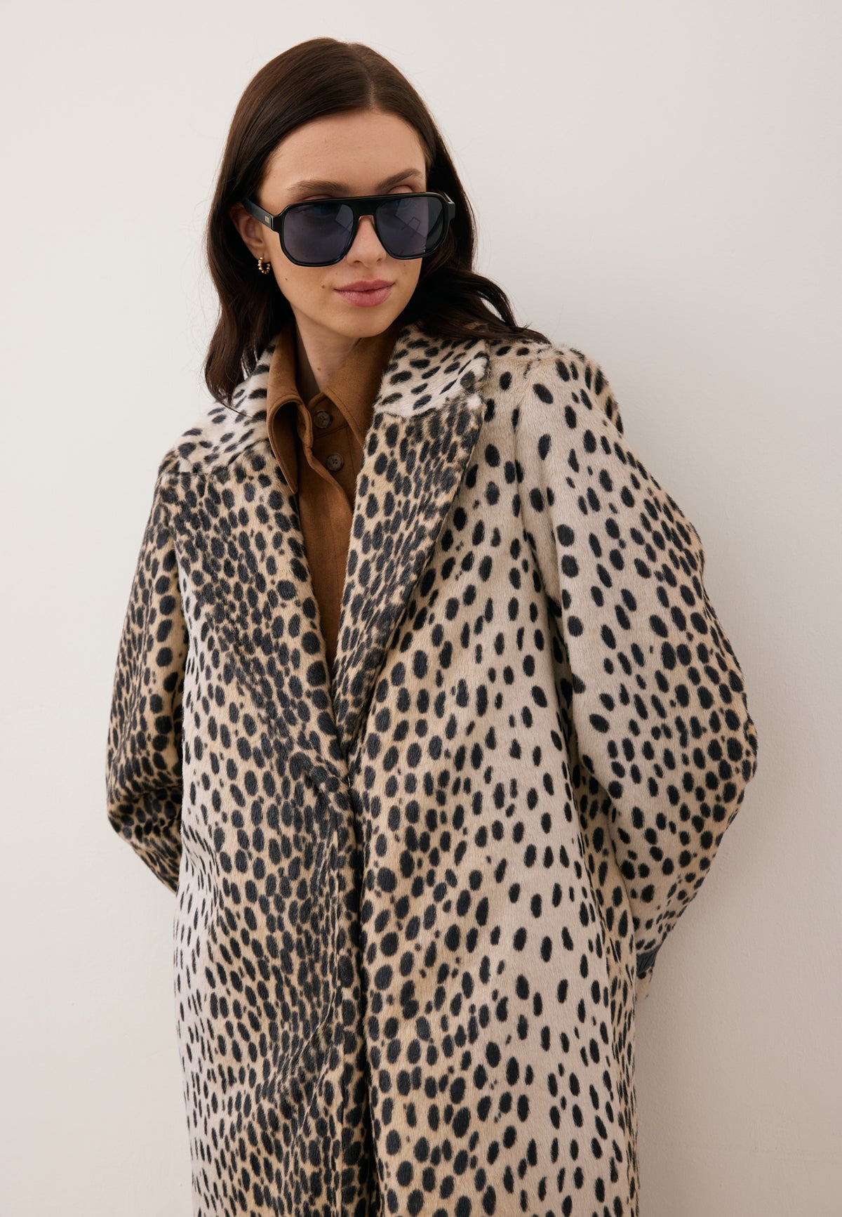 Close-up of the model wearing the short-pile faux fur PONTICELLI coat.