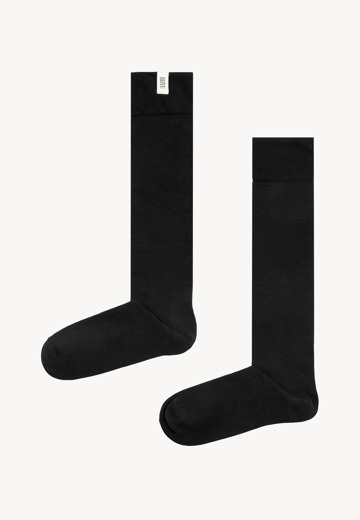 Black SCHOOLI knee-high socks with a jacquard bow and BIZUU logo.