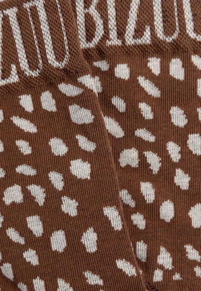 Beige SERAFIL socks in an original print